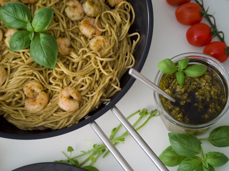 Pesto Ranch Shrimp specialty pizza with garlic shrimp and basil pesto