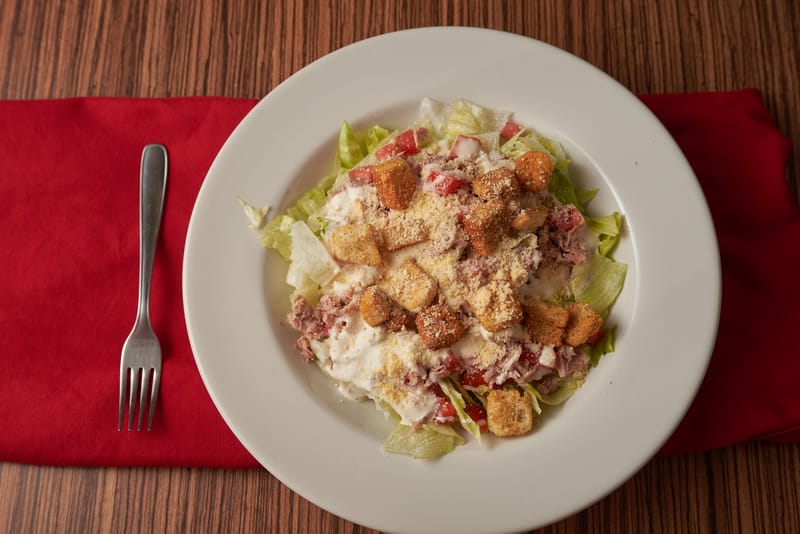 Classic Caesar Salad with romaine, croutons and Parmesan