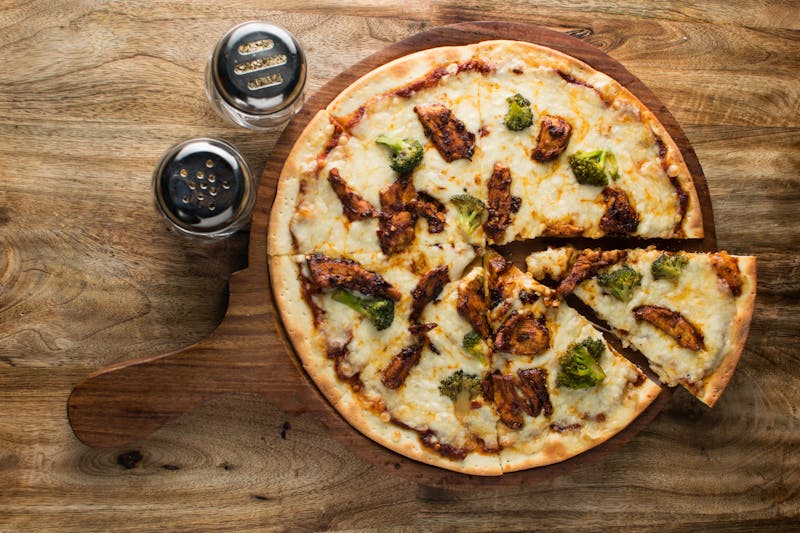 Freshly baked ranch pizza slice