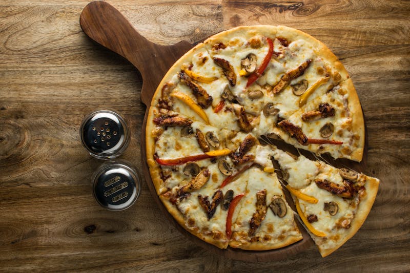 Spicy Ranch Sausage pizza with hot Italian sausage and jalapeños